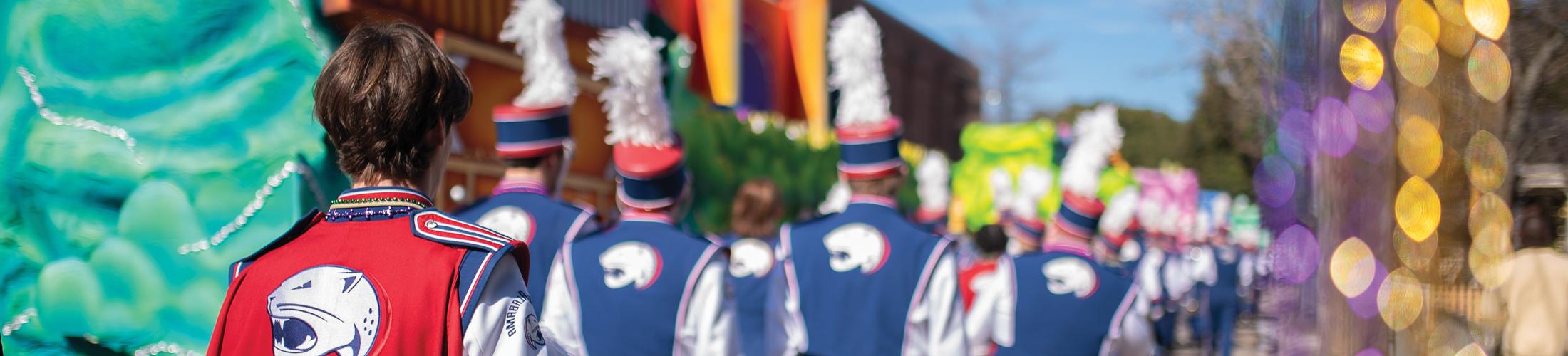 Back of marching band at Mardi Gras,